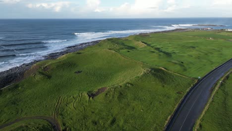Coastal-panoramic-road-with-sea-in-background-near-Doolin-Irish-village,-Ireland