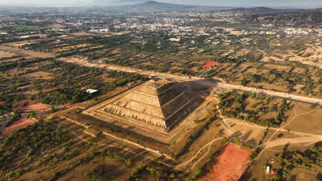 Aerial-view-around-the-Pyramid-of-the-sun,-golden-hour-in-Teotihuacan,-Mexico