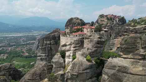 Meteora-Monastery-Popular-Tourist-Site-Landmark-in-Thessaly,-Greece-Mainland---Aerial-4k