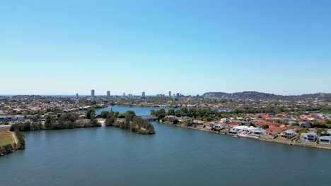 Panning-south-across-Lake-Orr-next-to-Varsity-Lakes-on-the-Gold-Coast-in-Queensland-Australia-towards-Burleigh