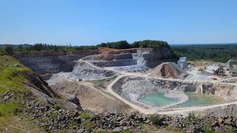 a-quarry,-in-the-photo-a-quarry-and-a-blue-sky-in-the-background