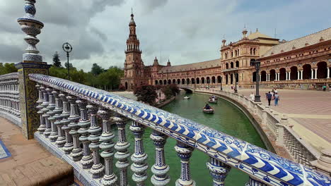 Ornate-marbled-bridge-archway-with-white-and-blue-tiles-in-Plaza-de-Espana