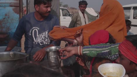 Non-Governmental-organisation-rationing-food-and-water-to-groups-of-locals
