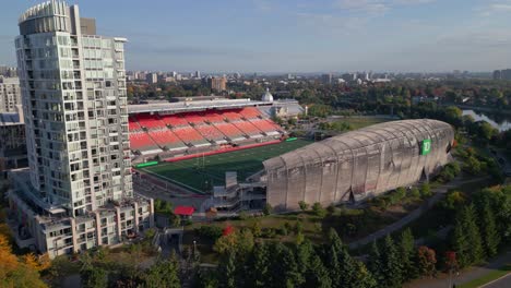 TD-Place-football-stadium-in-aerial-revealing-shot-during-autumn
