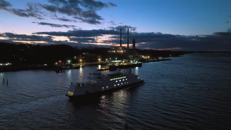 An-aerial-view-of-the-Port-Jefferson-ferry-departing-during-a-colorful-sunset