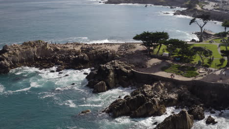 4K-cinematic-high-angle-tracking-shot-of-Lovers-Point-in-Pacific-Grove-California-on-a-sunny-day