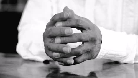 praying-to-god-with-hands-together-on-black-background-with-people-stock-video-stock-footage