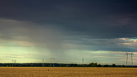 Rainstorm-And-Dark-Clouds-Seen-Across-Golden-Wheat-Field