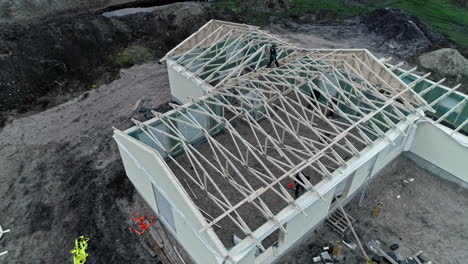 Aerial-drone-view-of-a-roof-house-under-construction-in-a-rural-area