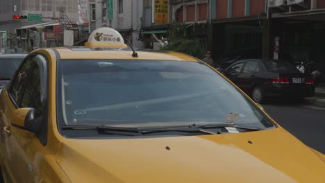 Taxi-Cab-Illegally-Parked,-Parking-Violation-On-Windshield-In-Taiwan