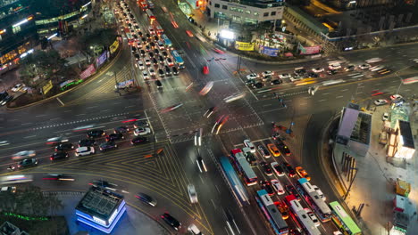 Gangnam-Station-Crossroads-Night-Traffic-Time-Lapse---Many-Cars-Flow-at-Gangnam-Streets-Intersection-in-Seoul-Downtown---Top-View