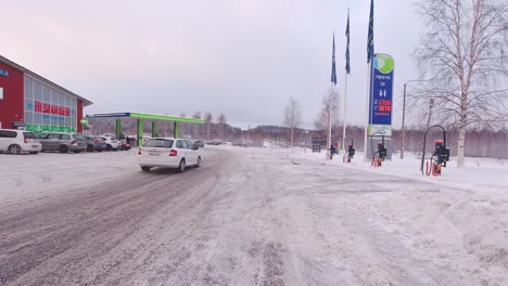Illuminated-sign-flickers-on-vehicle-service-station-Finlands-winter-climate