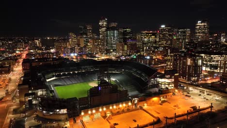 Night-time-aerial-Drone-orbit-of-the-famous-coors-field-baseball-stadium-in-Downtown-Denver,-Colorado