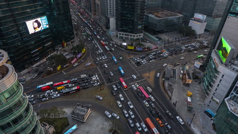 Seoul-Downtown-Gangnam-Station-Crossroad-Cars-Traffic-Flow-in-the-Evening---Rooftop-Top-Down-Time-Lapse