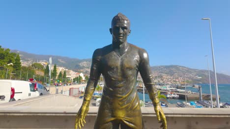 Close-up-shot-of-showing-statue-of-Cristiano-Ronaldo-at-port-of-Funchal-in-Portugal