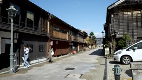 Japanese-Locals-Exploring-Nishi-Chaya-District-On-Sunny-Day