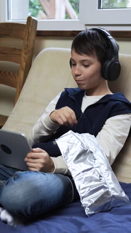 Teenager-using-tablet-at-home
