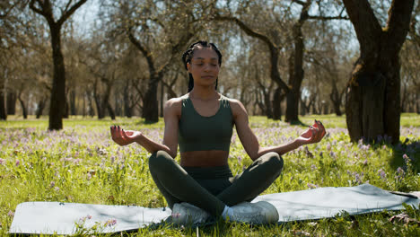 Woman-meditating-outdoors