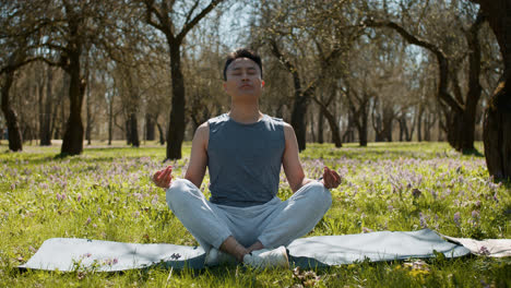 Man-meditating-outdoors