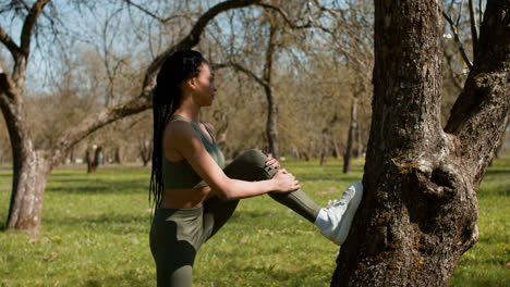 Woman-stretching-outdoors