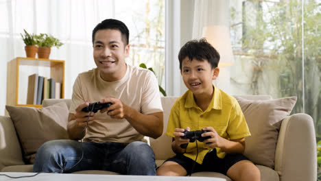Asian-man-and-boy-in-the-living-room