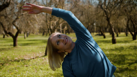 Woman-stretching-outdoors