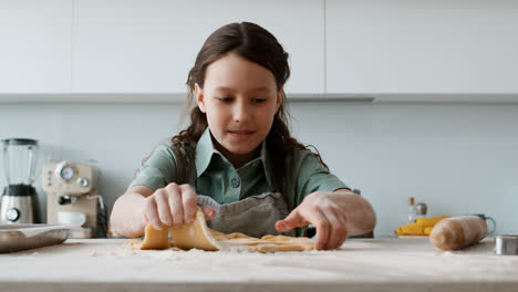 Girl-playing-with-dough