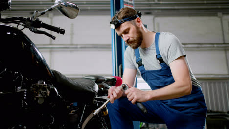 Man-working-on-a-motorcycle
