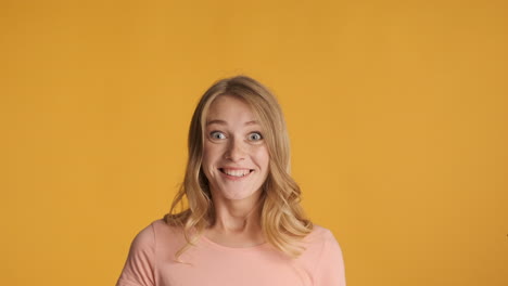 Caucasian-woman-looking-up-and-getting-surprised-on-camera.