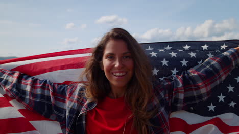 Woman-waving-national-american-flag