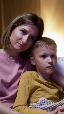 Mother-and-son-watching-film