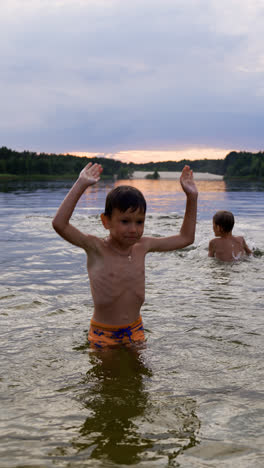 Father-and-son-swimming-in-the-lake