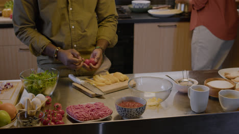 Couple-cooking-in-the-kitchen