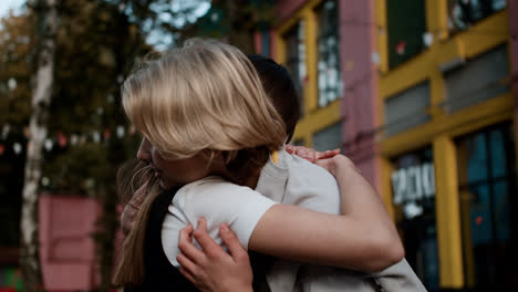 Teenage-boy-and-girl-hugging