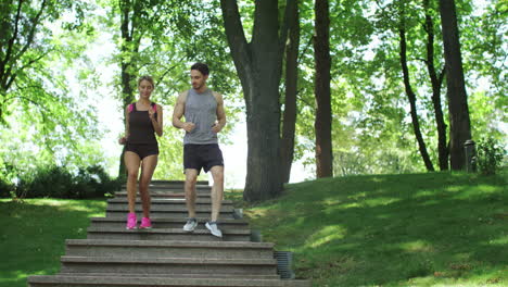 Fitness-couple-making-mobile-photo-at-outdoor-training