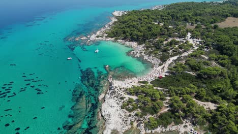Halkidiki-Beach-Kavourotrypes-and-Clear-Blue-Sea-Coastline-in-Greece---Aerial-4k