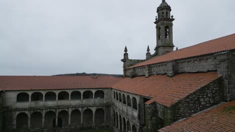Aerial-closeup-of-arched-windows-along-hallways-of-Santa-Maria-de-Xunqueira-monastery