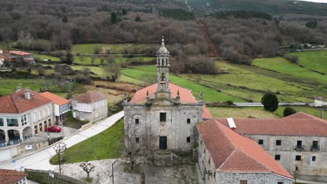 Aerial-pullback-from-Santa-Maria-de-Xunqueira-monastery-bell-tower