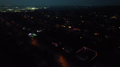 Aerial-shot-of-Christmas-lights-and-city-at-night