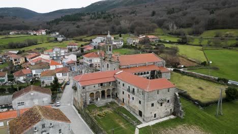 Drone-orbits-around-Santa-Maria-de-Xunqueira-monastery-and-vaulted-hallways