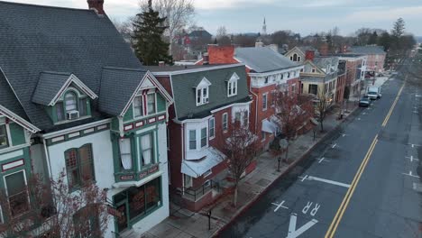 Aerial-establishing-shot-of-old-suburban-homes-in-winter