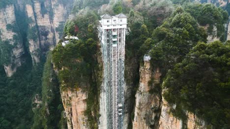 Bailong-lift-in-Zhangjiajie-National-Park,-China_-Drone-shot
