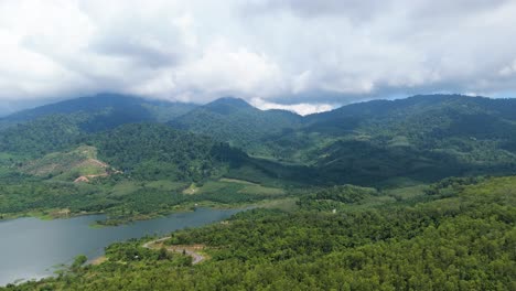 Krabi-Khao-Phanom-Bencha-Mountain-and-National-Park-with-Water-Reservoir,-Mountains-in-Southern-Thailand-covered-in-Clouds