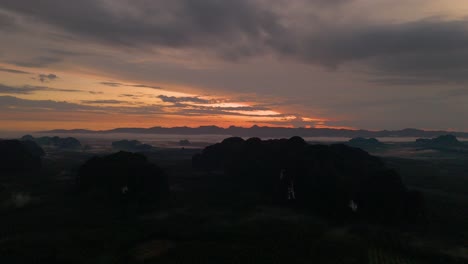 Sunrise-over-Krabi-Ao-Luek,-Early-Misty-Sunrise-with-Limestone-Rock-Cliffs-Karsts,-Good-Morning-Krabi