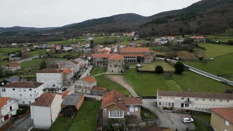 Aerial-pullback-of-sideview-of-Santa-Maria-de-Xunqueira-monastery
