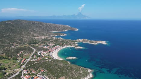 Halkidiki-Coast,-Beaches-and-Athos-Mountain-View-in-Sithonia,-Halkidiki,-Greece---Aerial-4k