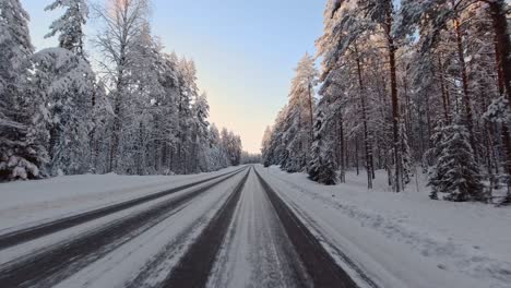 Careful-skilful-driving-POV-on-Finland's-Northern-climate-winter-roads