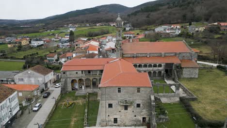 Left-orbit-around-old-Santa-Maria-de-Xunqueira-monastery-and-powerlines