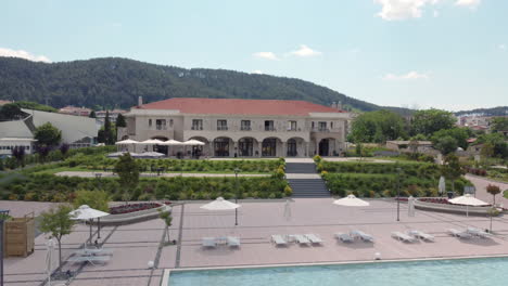 Drone-footage-of-the-high-end-villa-that-includes-a-pool-in-the-city-of-Ioannina,-Greece