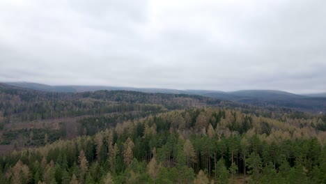 Backward-Panorama-Of-Aerial-Shot-Through-The-Mountains